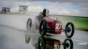 Dies ist ein KI-generiertes Bild mithilfe von Gemini. Ein Cyclekart jagt bei Regen die Piste entlang.